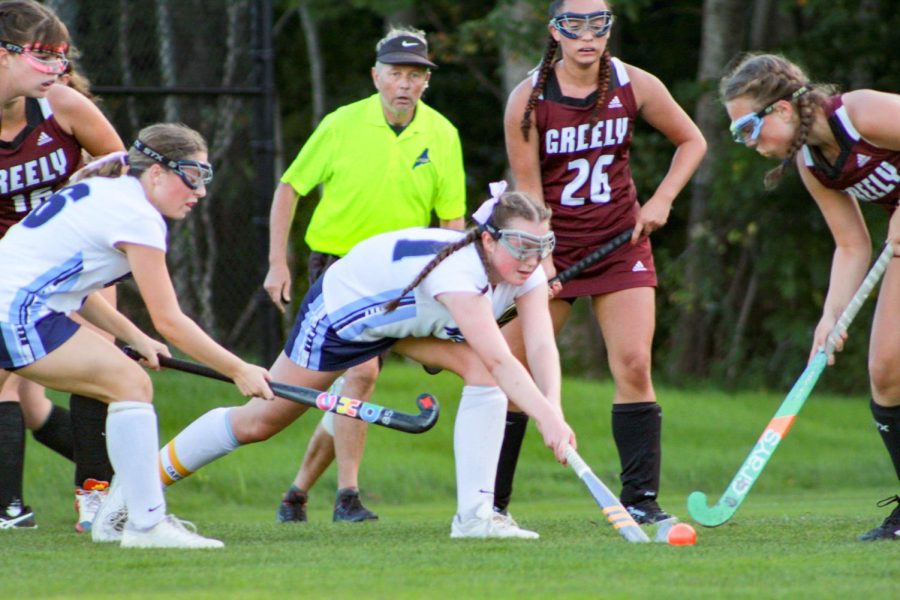 York field hockey playing against Greely. Abigail Dickson picture with ball