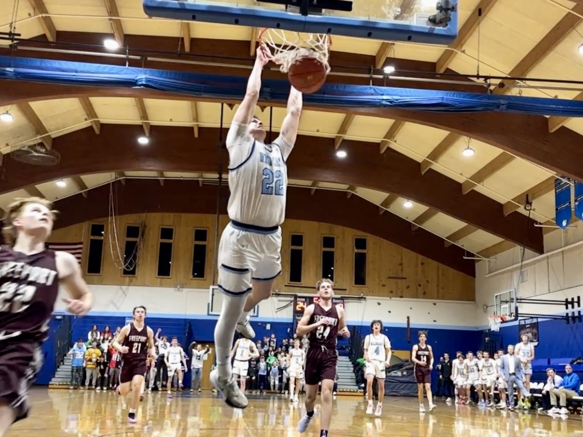 Lucas Bouchard throws down a big dunk against Freeport in the win.